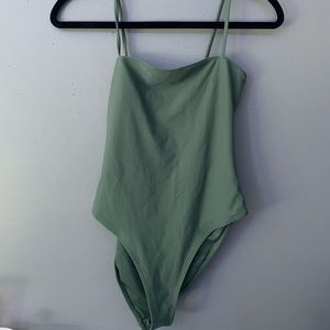 Green one piece bathing suit